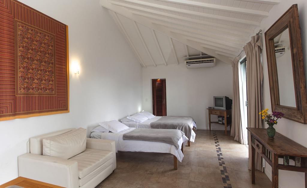 Passeio das Palmeiras Búzios Quarto foto
